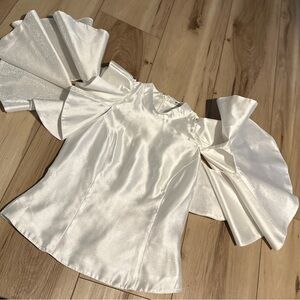 Strike A Pose with this statement blouse! Why dress brand